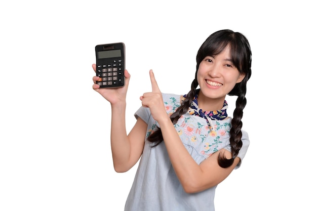 Portrait of beautiful young asian woman in denim dress holding calculator on white background business shopping online concept