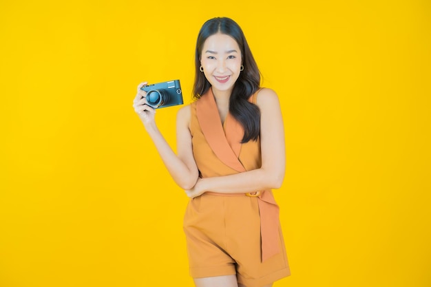 Portrait of beautiful  young asian woman use camera  