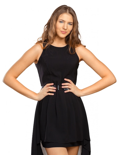 Portrait of beautiful young blonde girl in black dress