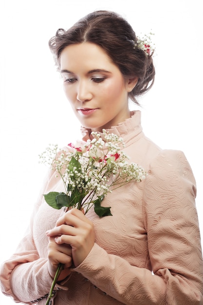 Portrait of beautiful young bride in pink dress