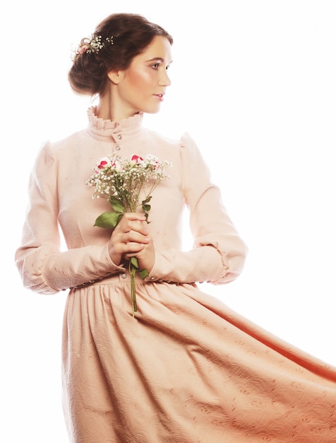 Portrait of beautiful young bride in pink dress