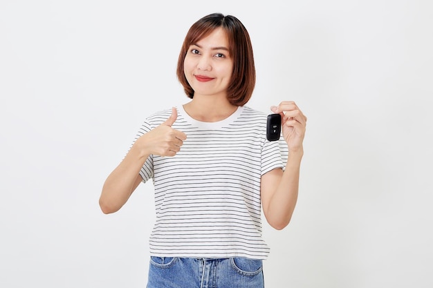 Photo portrait beautiful young business asian woman with car key