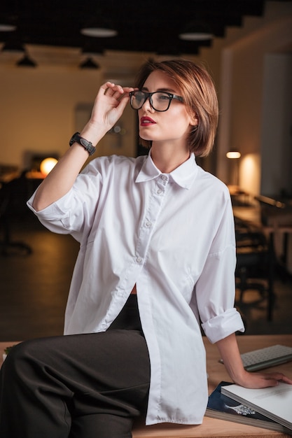 Portrait of beautiful young businesswoman in glasses