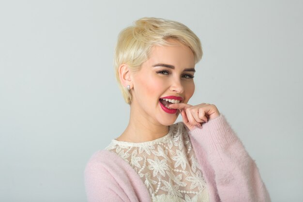 portrait of beautiful young female with short haircut and makeup