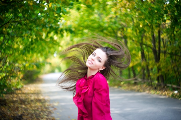 Portrait of beautiful young girl in nature