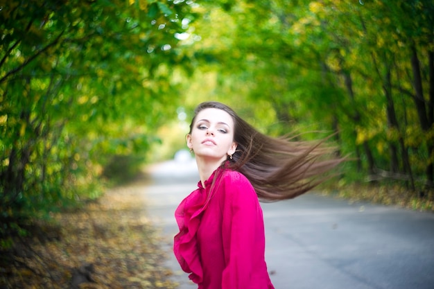 Portrait of beautiful young girl in nature