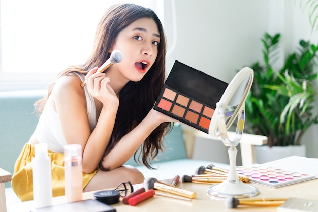 Portrait of beautiful young girl with makeup in the morning