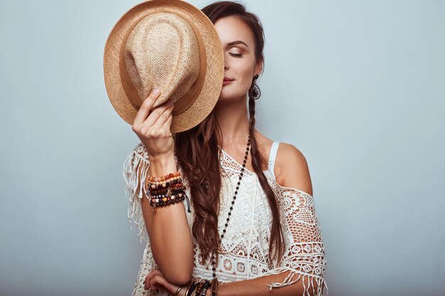 Portrait of beautiful young hippie woman 