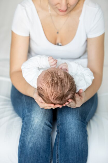 Portrait of beautiful young mother with her child