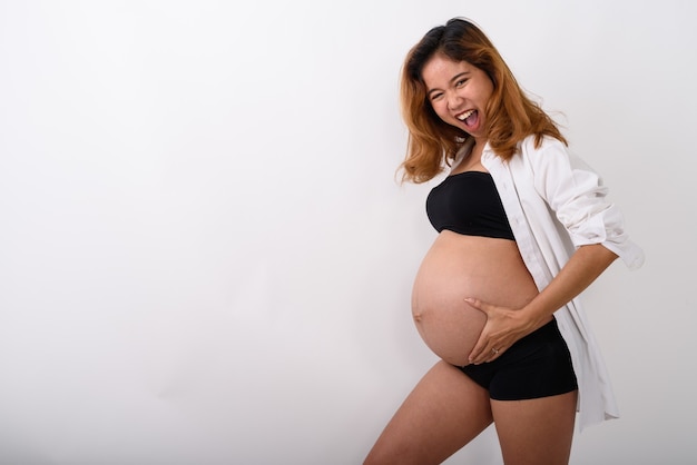 Portrait of beautiful young pregnant Asian woman