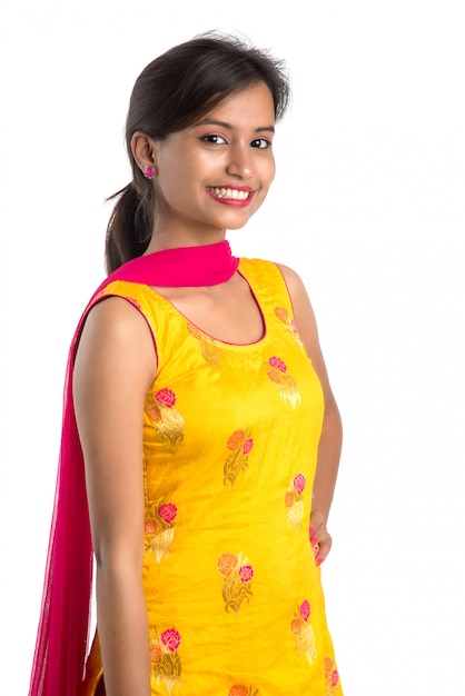 Portrait of beautiful young smiling girl on a white .