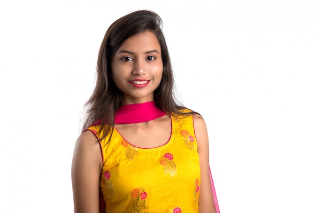 Portrait of beautiful young smiling woman on white.