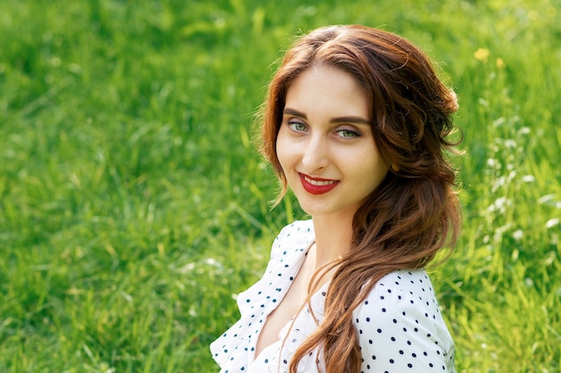 Portrait of beautiful young smiling woman