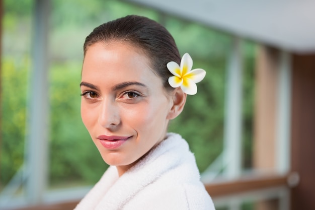 Portrait of a beautiful young woman in bathrobe