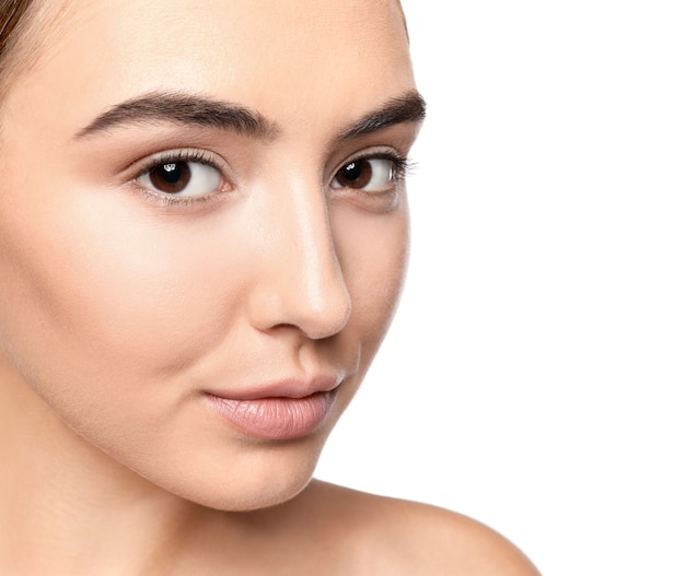 Portrait of beautiful young woman before applying eyelash extensions isolated