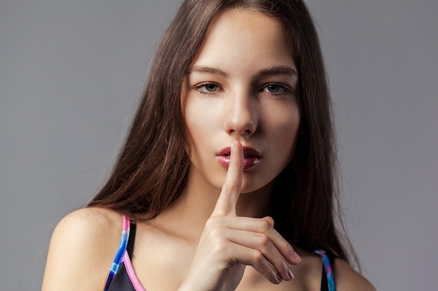 Portrait of a beautiful young woman, isolated