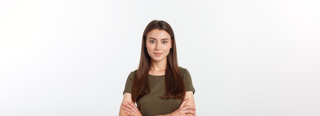 Portrait of a beautiful young woman looking at the camera and smiling isolated on a white background