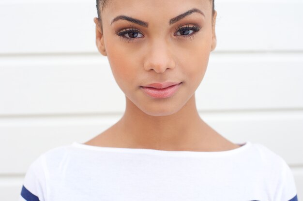 Portrait of a beautiful young woman looking at camera