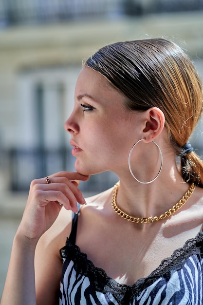 Portrait of a beautiful young woman in profile