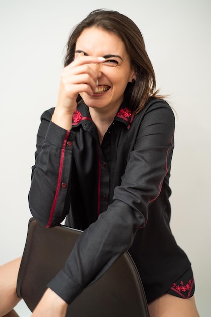 portrait of a beautiful young woman wearing fashion shirt