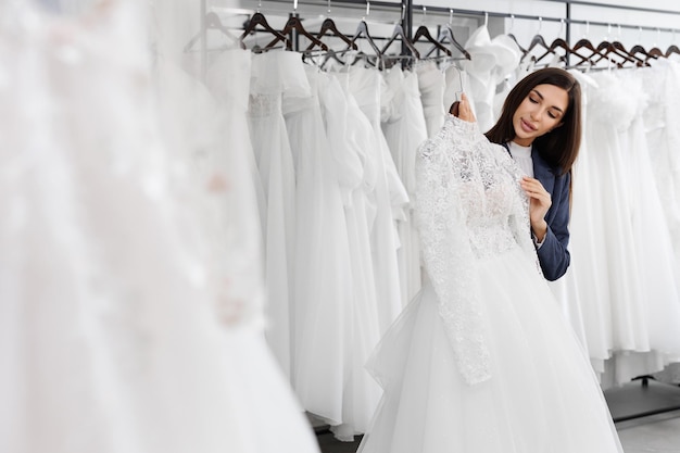 Portrait of a beautiful young woman in a wedding salon