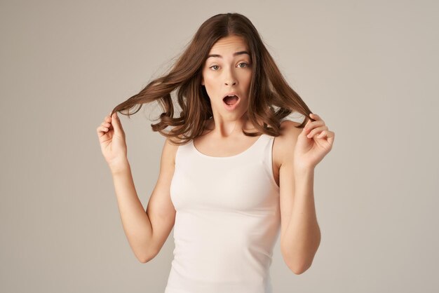 Portrait of a beautiful young woman over white background