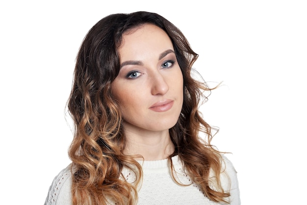 Portrait of beautiful young woman on white background