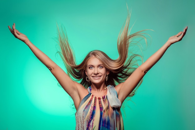 Portrait of a beautiful young woman with long hair