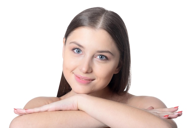 Portrait of beautiful young woman with perfect skin posing