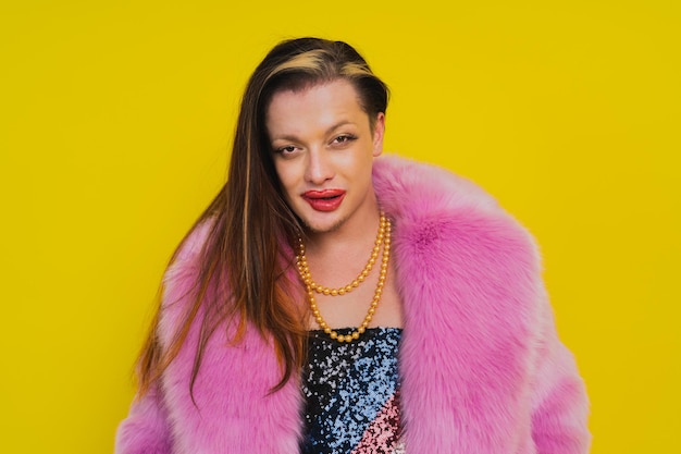 Portrait of a beautiful young woman over yellow background