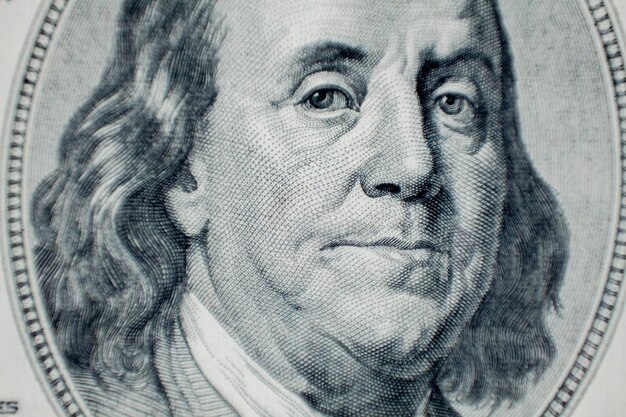 Photo portrait of benjamin franklin macro from one hundred dollars bill