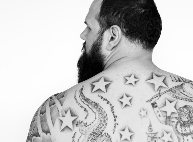 Portrait of a big tattooed bearded man