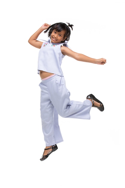 Portrait of Black asian child jumping isolated on white .