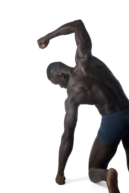 Portrait of a black athletic man on his back