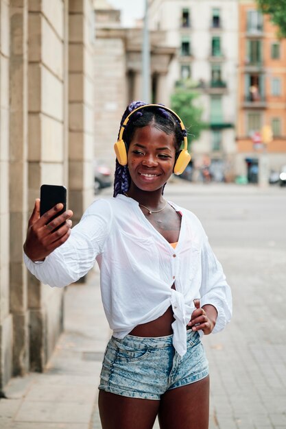 Portrait of a black girl walking in the city