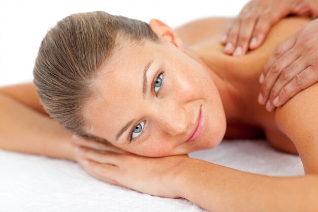 Portrait of blond woman enjoying a massage