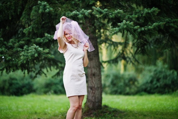 Portrait of blonde curly future bride at hen party