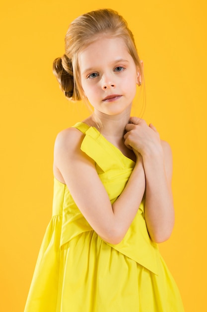 Portrait of a blonde girl in waist.