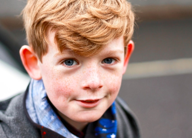 portrait of boy in city