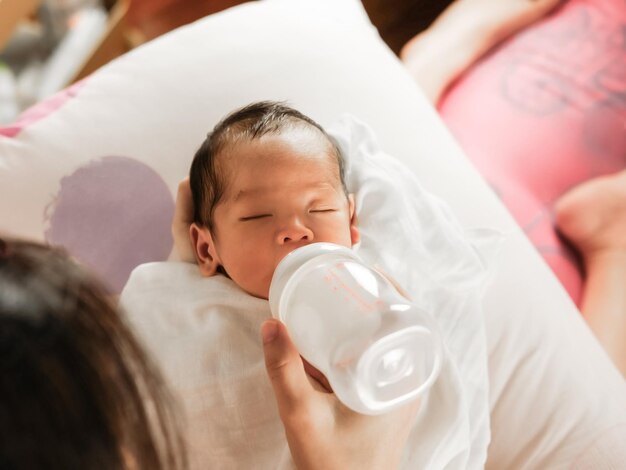 Portrait of boy drinking water