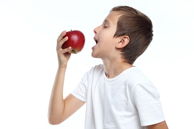 Portrait of Boy eating an apple