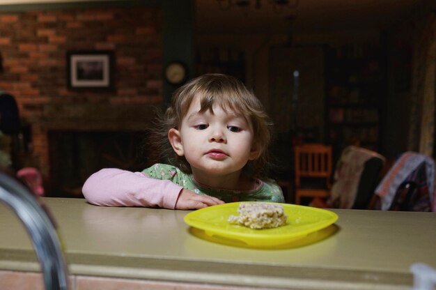 Portrait of boy eating food