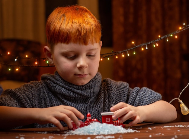 Portrait of a boy of eight years old with New Year's decor