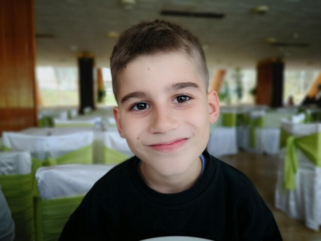 Portrait of boy smiling at restaurant