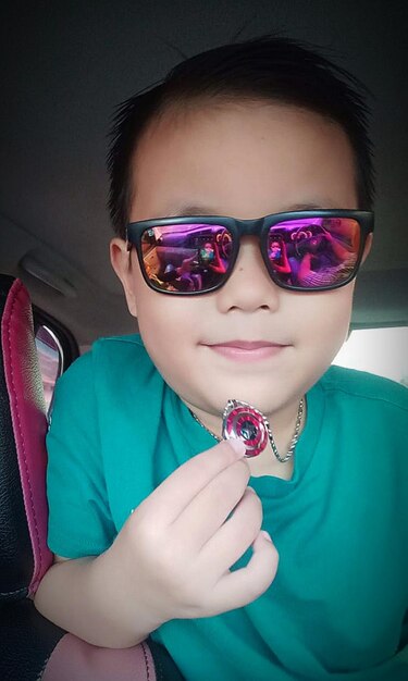 Portrait of boy wearing sunglasses