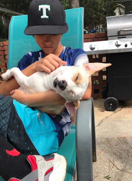 Portrait of boy with dog