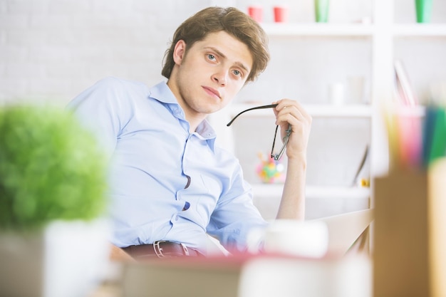 Portrait of boy at workplace