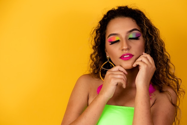 Portrait of Brazilian woman with colorful eye makeup