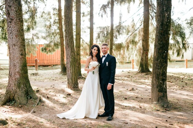 portrait of bride and groom at nature