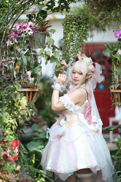 Portrait of bride standing in park